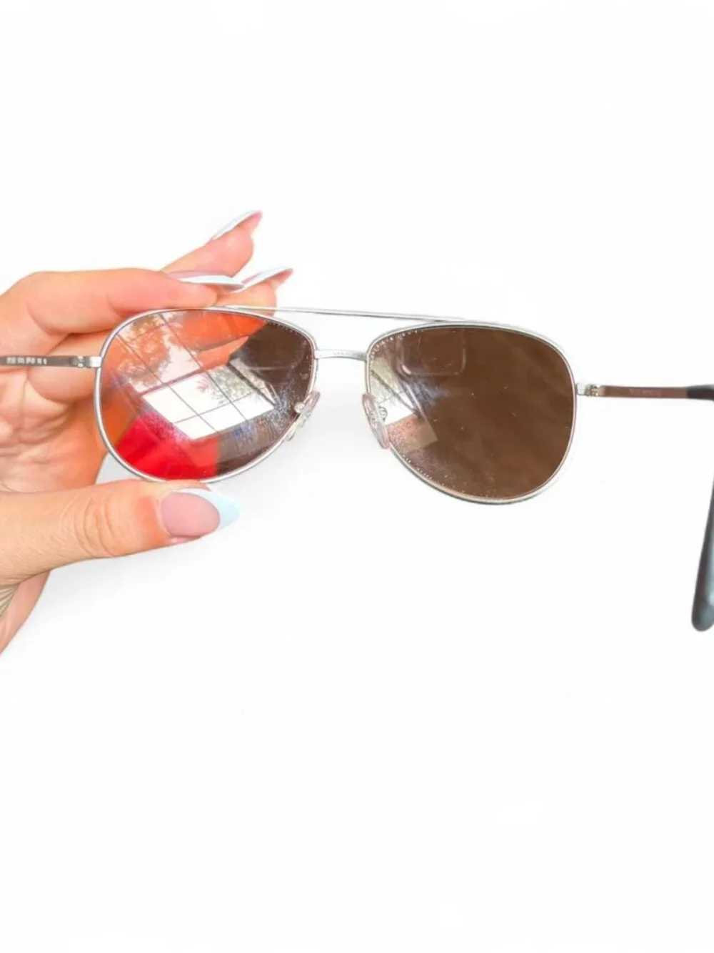 Prada Linea Rossa PS 55US aviator sunglasses, matte silver frame orange lens